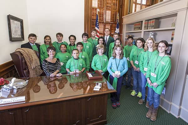 Dr. Campbell with students at her office