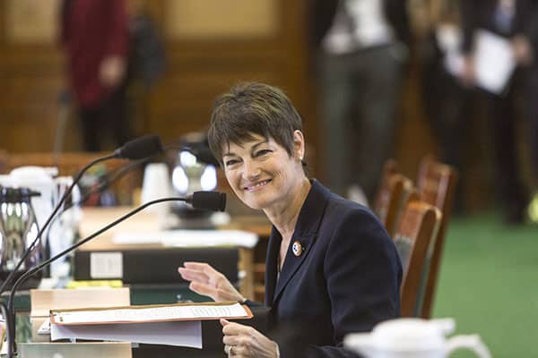 Dr. Campbell smiling at committee hearing